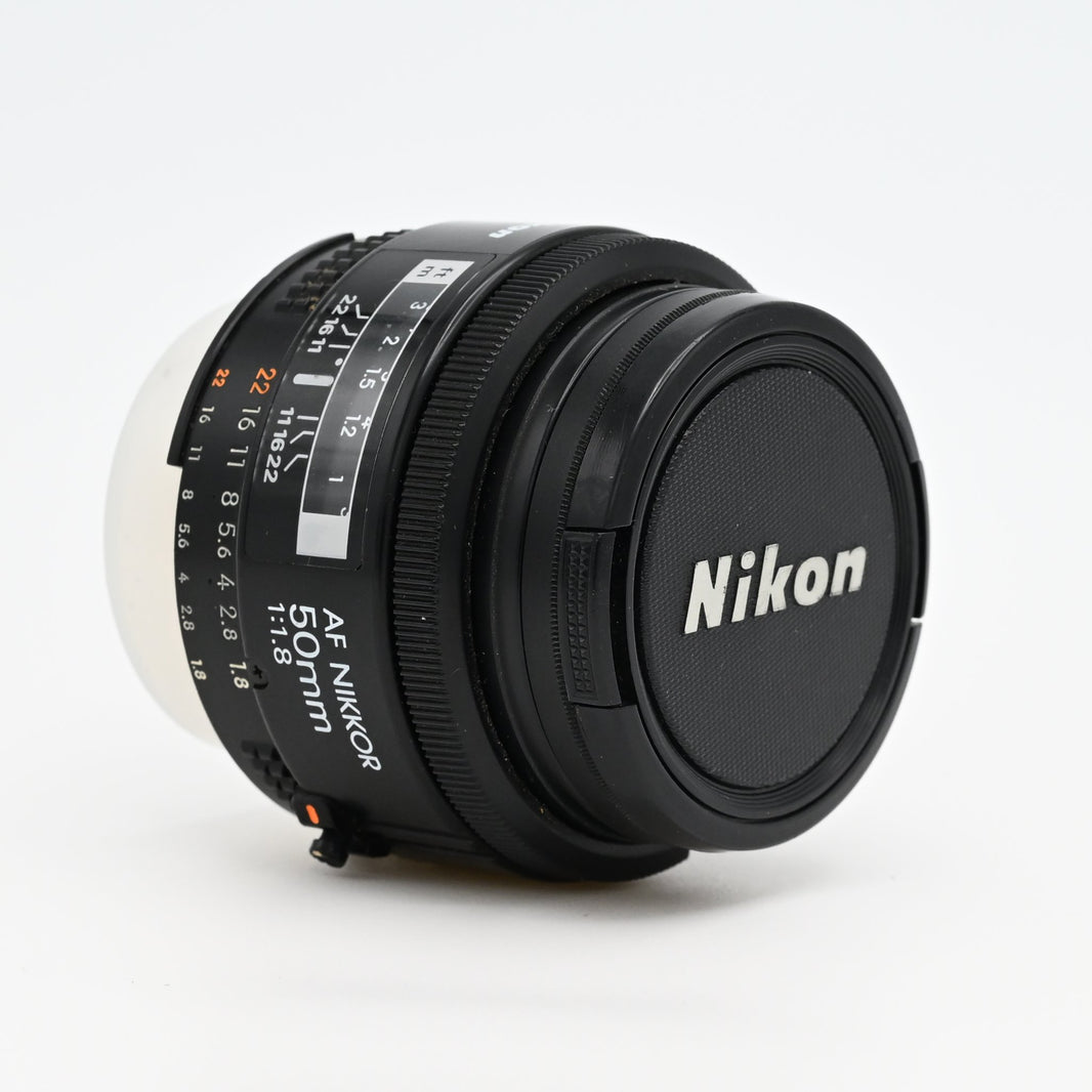 Nikon AF Nikkor 50mm f/1.8 Prime Lens Excellent + Caps & Skylight Filter