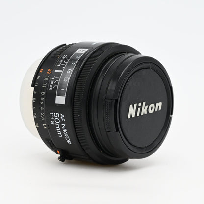 Nikon AF Nikkor 50mm f/1.8 Prime Lens Excellent + Caps & Skylight Filter